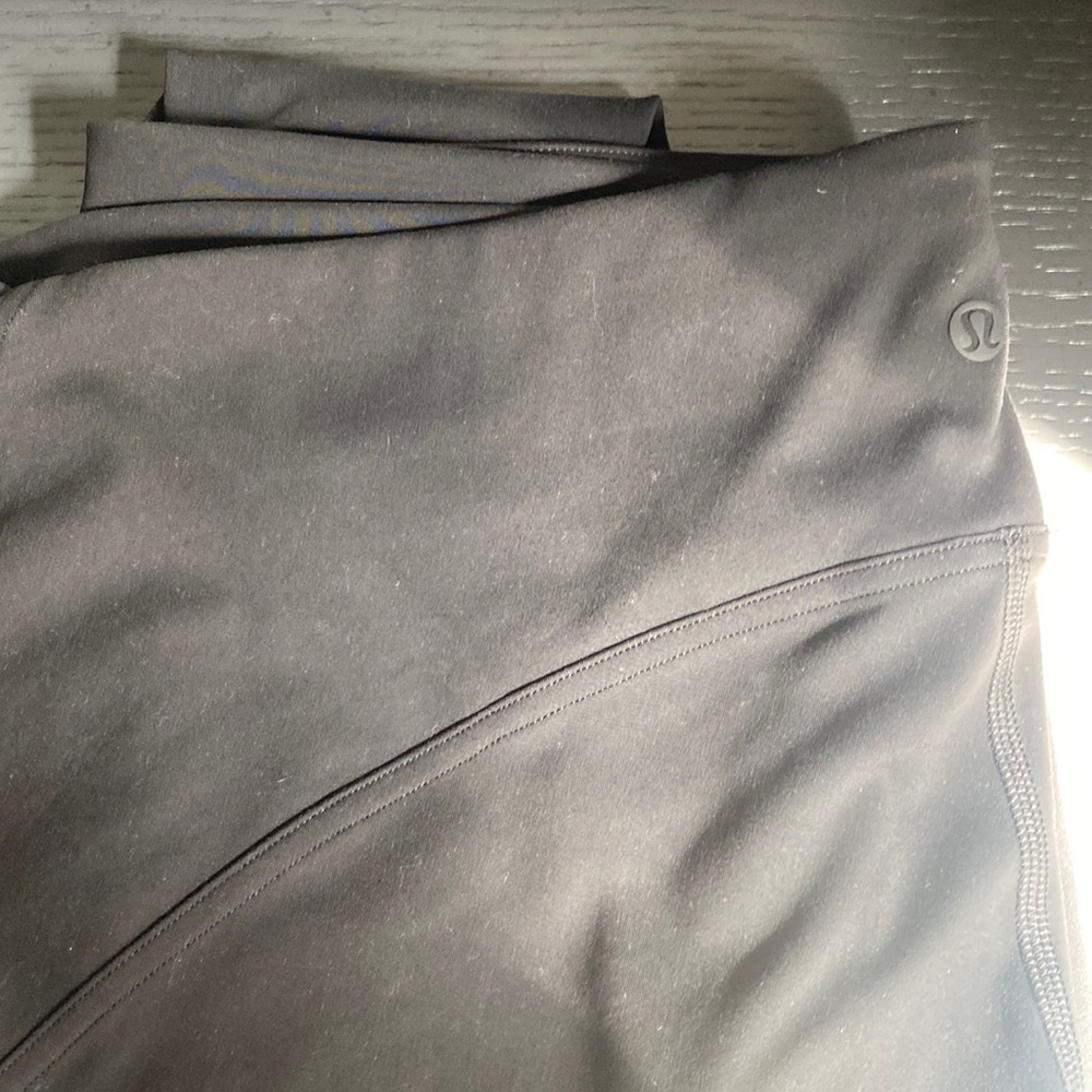 Brand  new Lululemon Black leggings- tight 25”